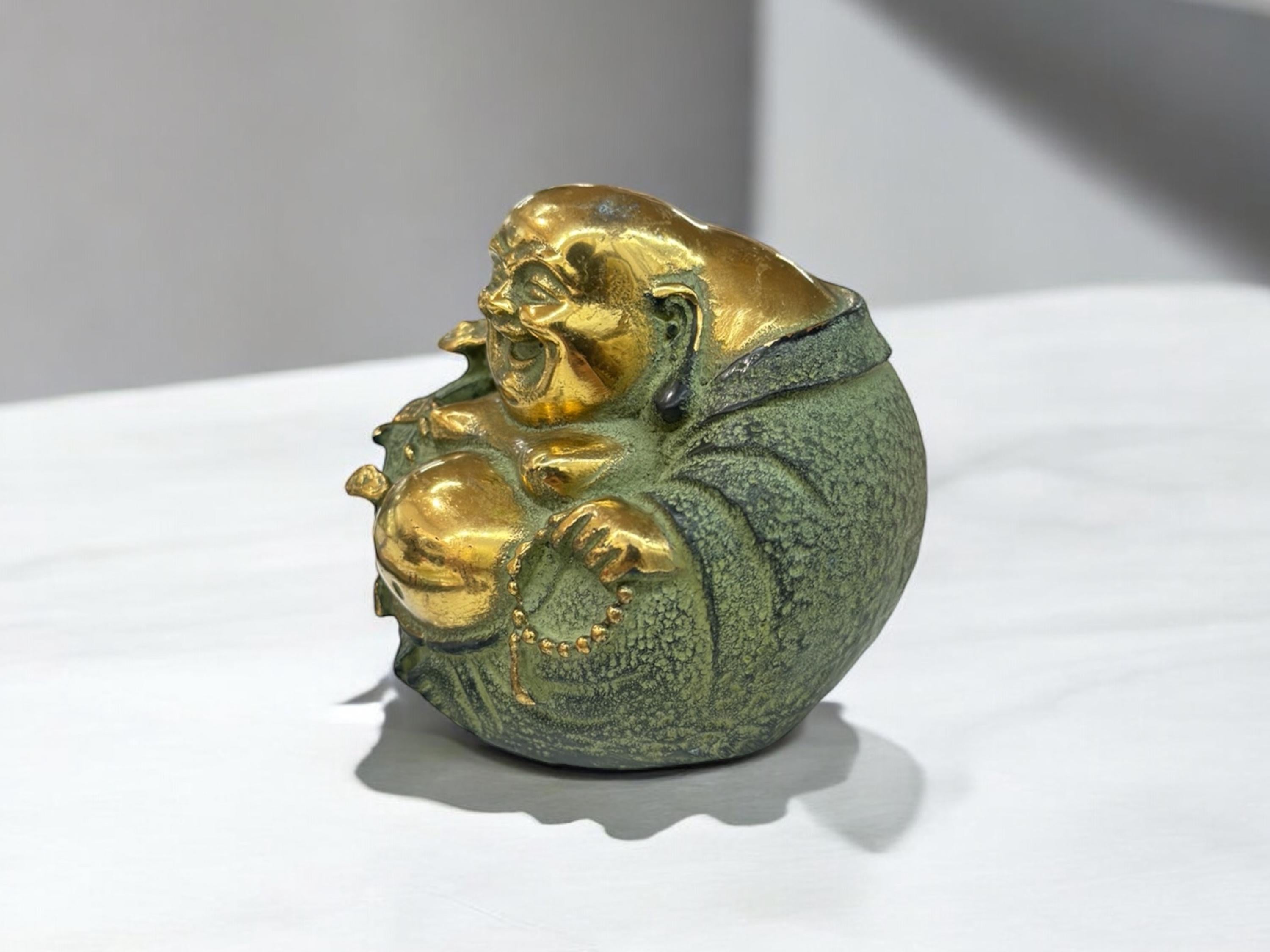 brass laughing Buddha