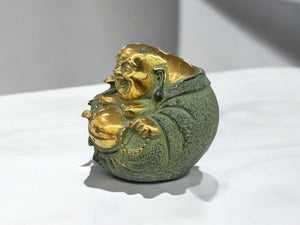 brass laughing Buddha