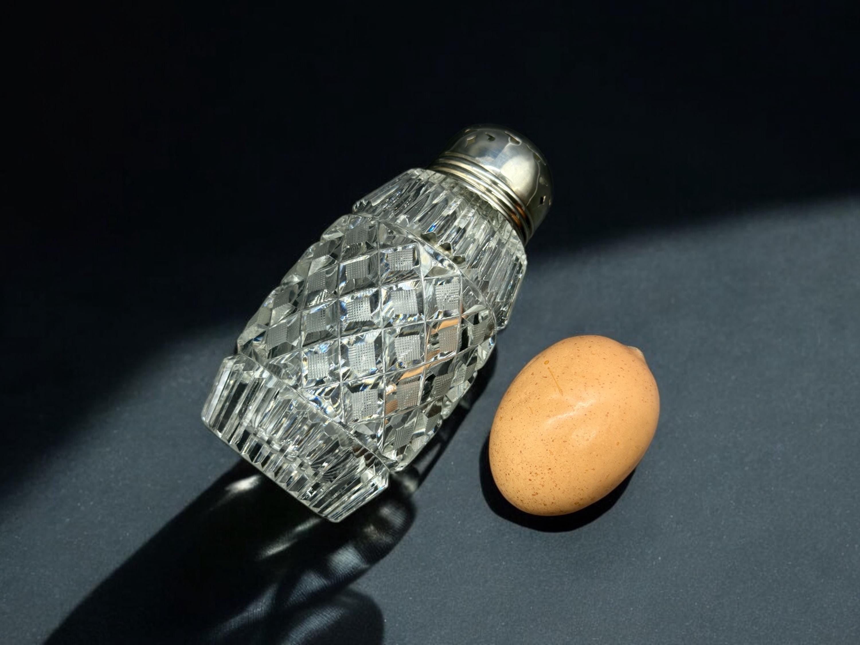 hand cut crystal sugar shaker with silver plated lid