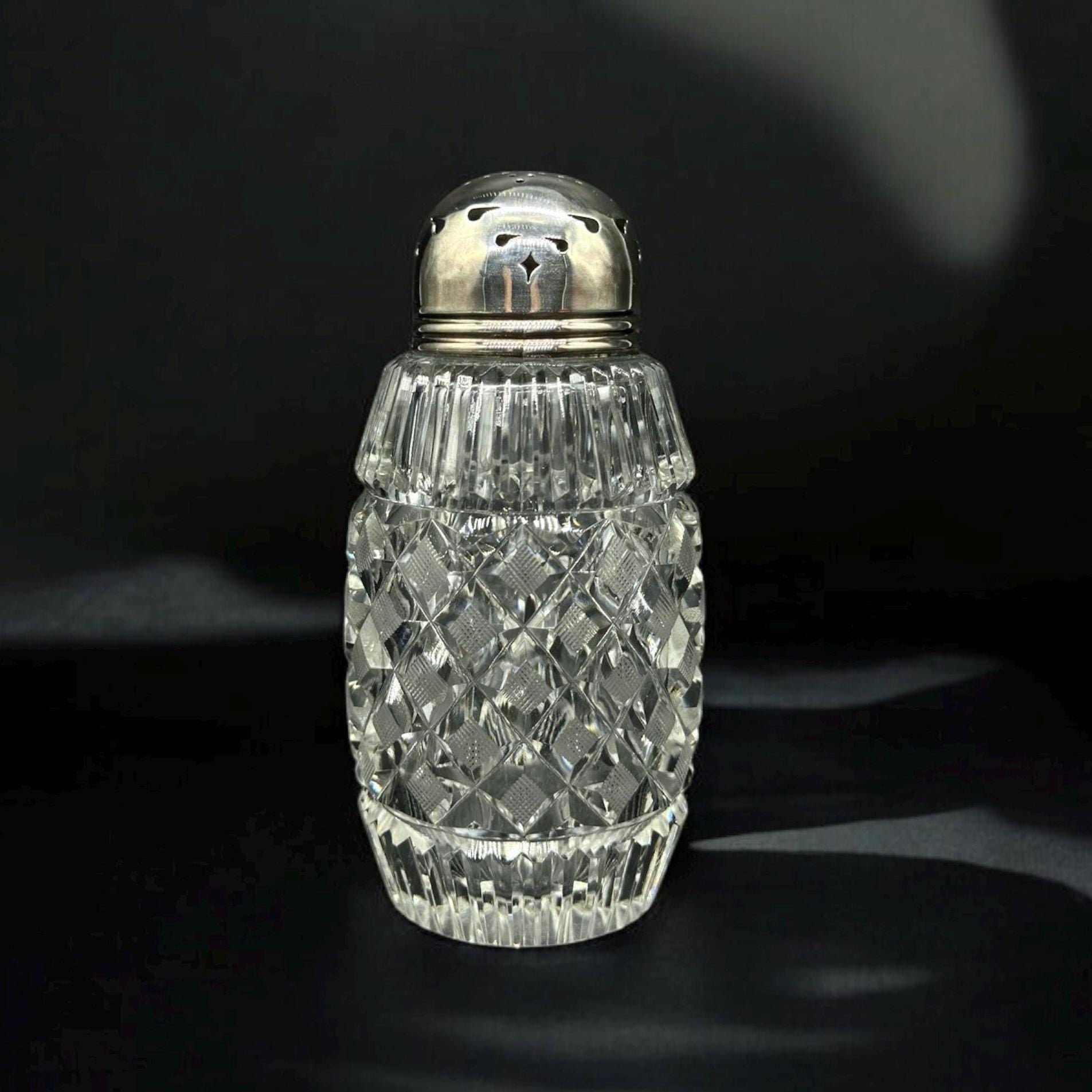 hand cut crystal sugar shaker with silver plated lid