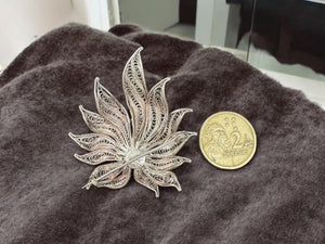 Vintage filigree flower brooch