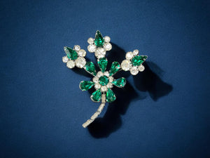 Green and clear rhinestone flower design brooch
