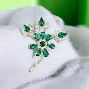 Green and clear rhinestone flower design brooch
